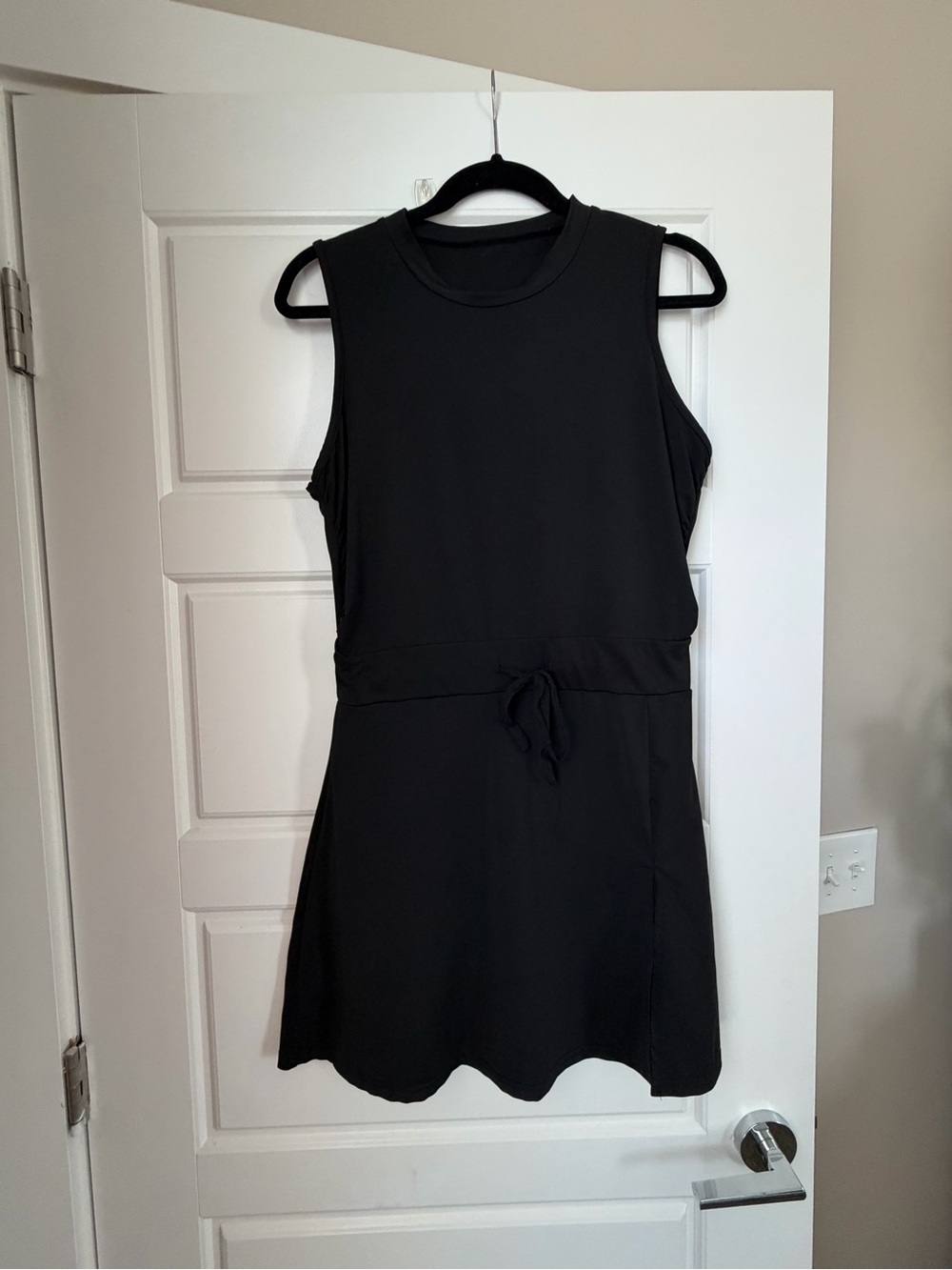 XL Sleeveless Black Tennis Dress, brand unknown.